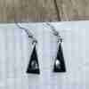 Black triangle earrings with shell, on selenite